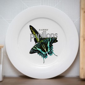 White plate with a butterfly illustration and the word 'papillons'