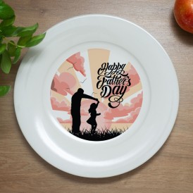 White plate with a silhouette of a father and child and the text 'Happy Father's Day'