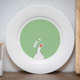 White plate with an illustration of a goose saying 'Hi'