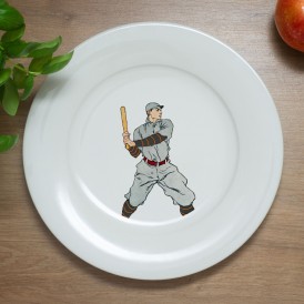 White plate with a vintage illustration of a baseball player holding a bat